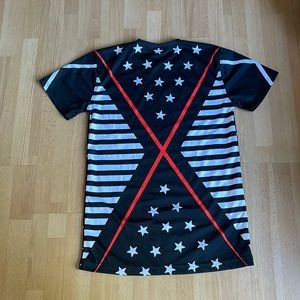 A Patterned Black, Red, and White T-Shirt